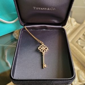 New 18k gold Tiffany & Co. diamond necklace and